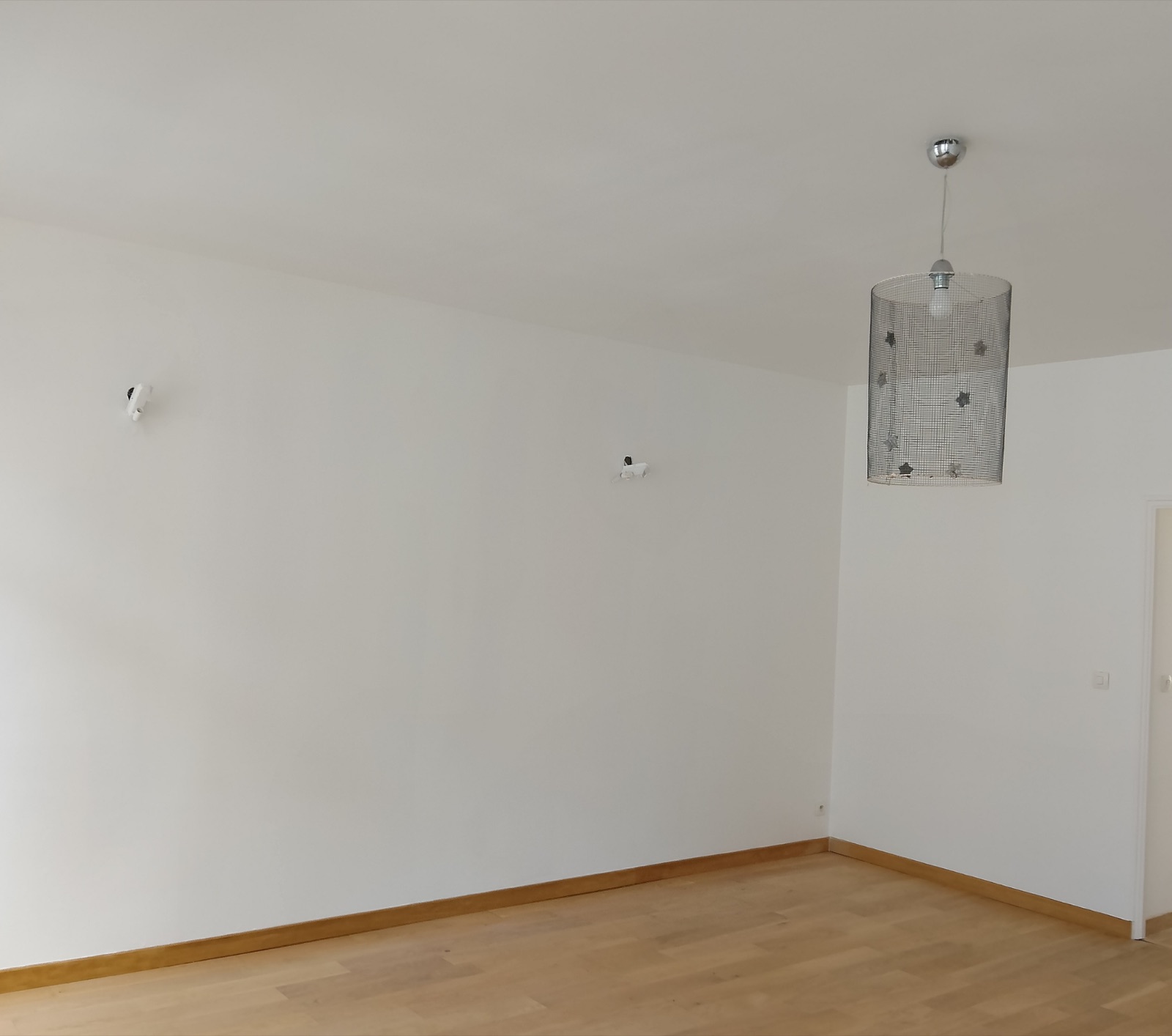 Mur doublé et fini après isolation thermique par l'intérieur à Tourcoing